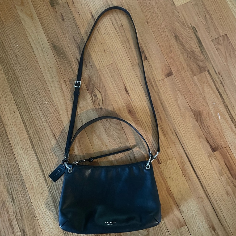 Coach, black leather handbag.